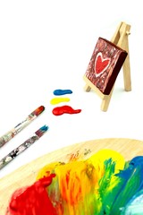 Painting on easel and colors