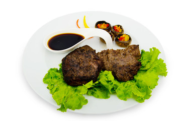 Steak with sauce in the plate