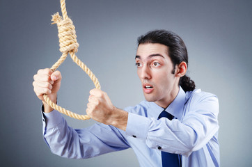 Businessman committing suicide through hanging