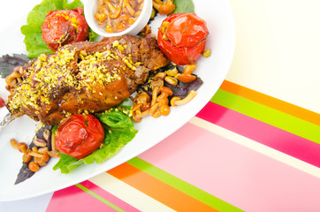 Lamb leg served in the plate