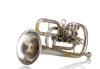 Obraz premium old trumpet isolated on white