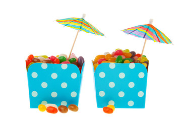 Cartons colorful candy with parasols