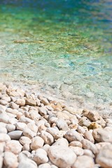 Soft wave of the sea on the pabble-stone beach