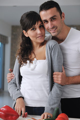 Fototapeta premium young couple have fun in modern kitchen
