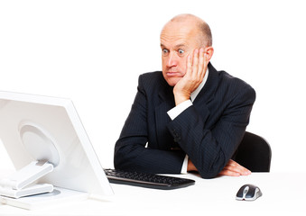 amazed businessman looking on monitor