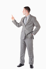 Portrait of a businessman pointing at something
