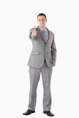 Fototapeta premium Portrait of a businessman with the thumb up
