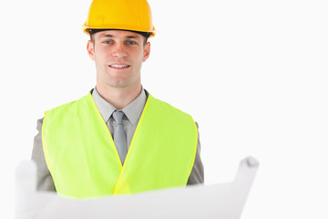 Builder holding a plan