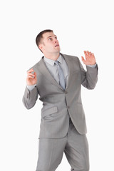 Portrait of a surprised young businessman