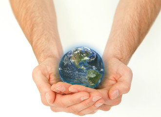 Masculine hands holding a planet globe