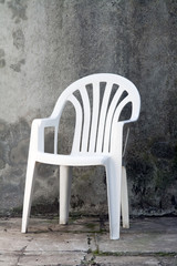 white plastic chair