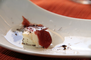 Appetizer Feta cheese with duck ham restaurant Denia Alicante Co