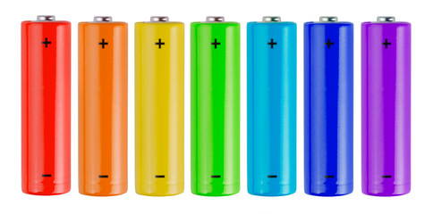 Row of rainbow colors batteries isolated on white