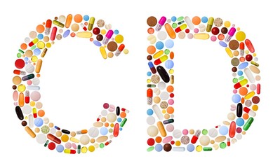 Characters C and D made of colorful pills