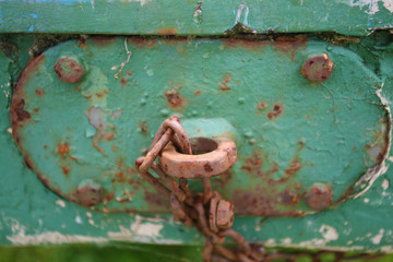 Rusted grunge panel with chain