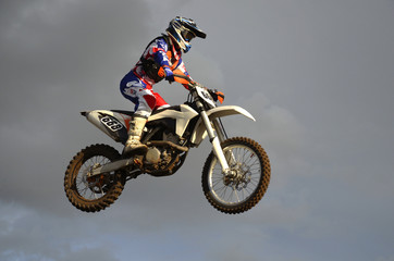 The spectacular jump motocross racer on a motorcycle © VVKSAM