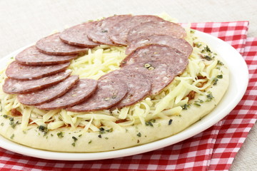 raw italian salami pizza