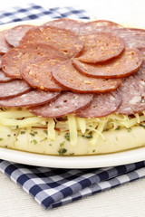 raw salami and pepperoni pizza