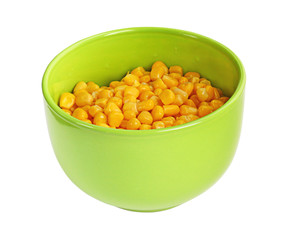 A corn is in a drinking bowl