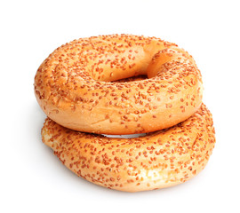 delicious bagels with sesame seeds isolated on white