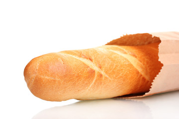 delicious baguette in paper bag isolated on white