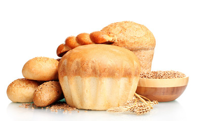 delicious round bread, buns and wheat isolated on white