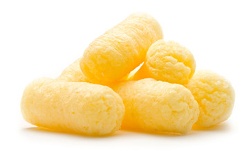 Crunchy corn snacks on white background
