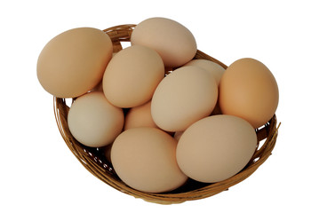 Eggs in a basket on white