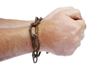 Man's hands chained in a chain
