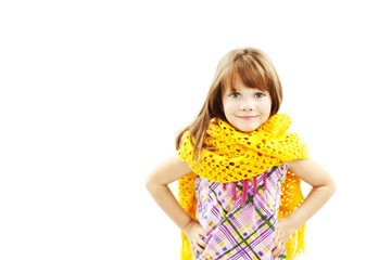 Portrait of funny lovely little girl wearing scarf