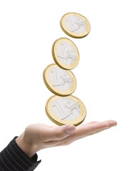 Geldmünzen mit Hand