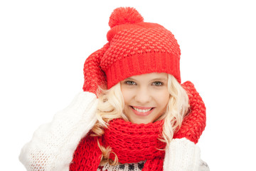 beautiful woman in hat, muffler and mittens