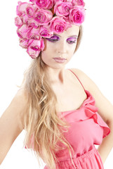 Naklejka premium young beautiful woman with pink flowers