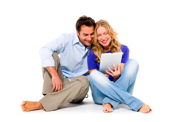 couple using digital tablet