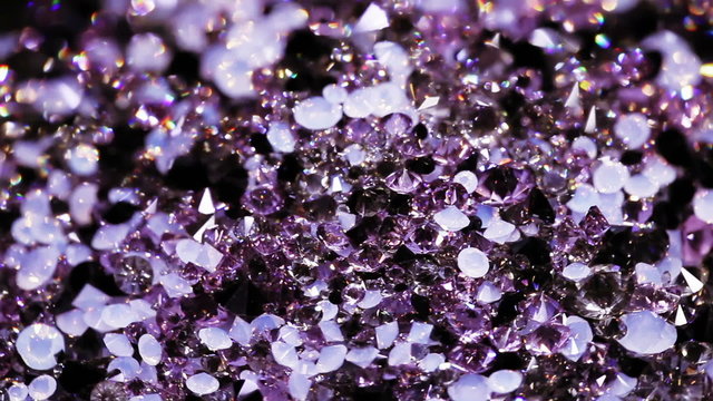 Small diamond jewel stones rotating, luxury background