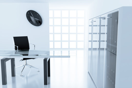 Light modern cubicle with a table and an armchair in a time off