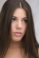 Obraz premium woman with shiny long brown hair.