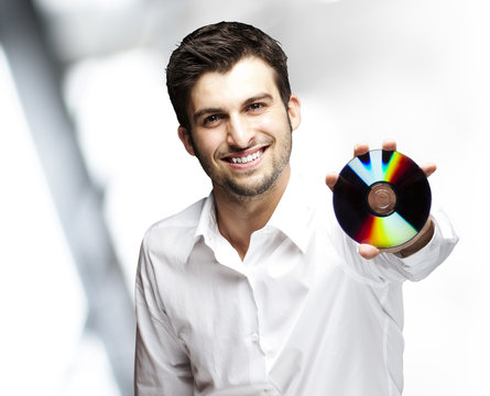 man holding cd