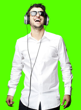 man listening to music over removable chroma key background