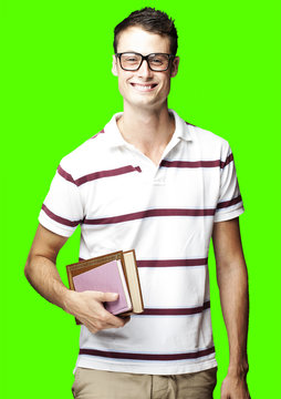 man holding books over removable chroma key background