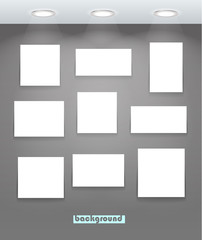 White illuminated boards on grey wall. Content template