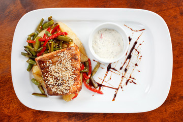 Fish steak with vegetables