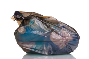 black garbage bag with trash isolated on white