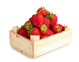 Strawberries in wooden box isolated on white