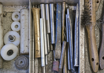 tools in drawer - chisel, punch, steel brush