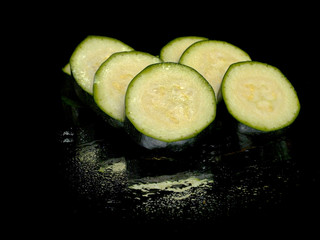 green zucchini slices - obrazy, fototapety, plakaty