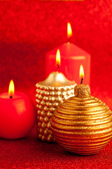 christmas candles group on red glitter