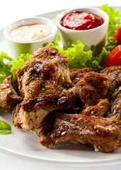 Grilled steaks and vegetables