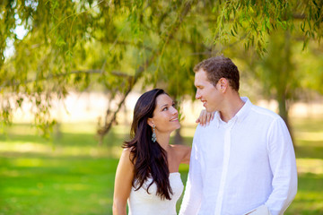 couple in love happy in green park outdoor