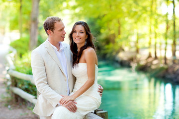 couple of lovers in love in park river hug